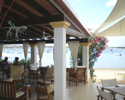 Copyright image: A stunning attached lean-to pergola by the sea.