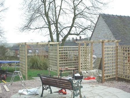 Copyright image: Pergola construction with trellis.