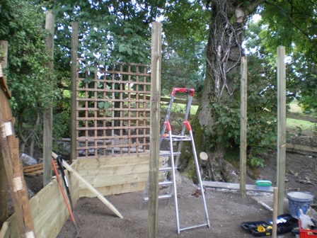 Copyright image: Corner pergola construction.