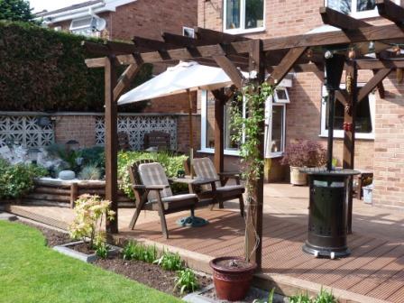 Copyright image: A fantastic attached lean-to pergola with garden seat.