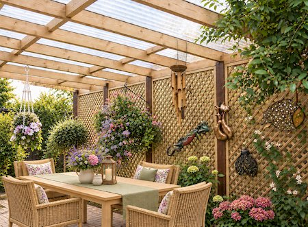 Copyright image: A fantastic attached lean-to pergola made using the step-by-step attached pergola plans.