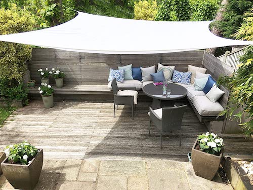 Amazing outdoor seating area with shade sail.