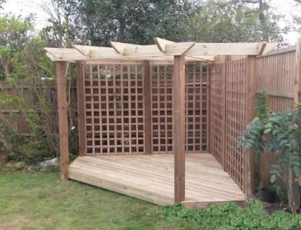 Copyright image: Amazing corner pergola with deck made from the corner pergola plans.