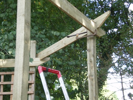 Copyright image: Corner pergola construction.