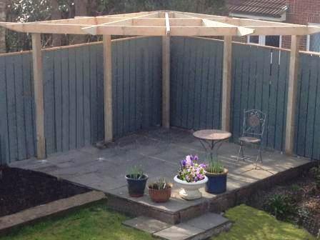 Copyright image: Tony's corner pergola on a patio, with wonderful radiating rafters.