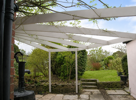 Copyright image: Tom's corner pergola design adapted from the corner pergola plans.