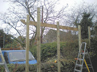 Copyright image: Corner pergola construction showing notched rafters.