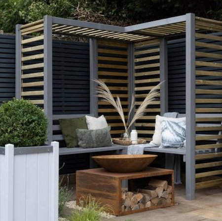 Beautiful and cosy Firenze corner pergola grey and natural.