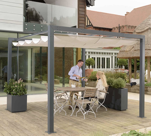 Modern metal pergola with retractable canopy.