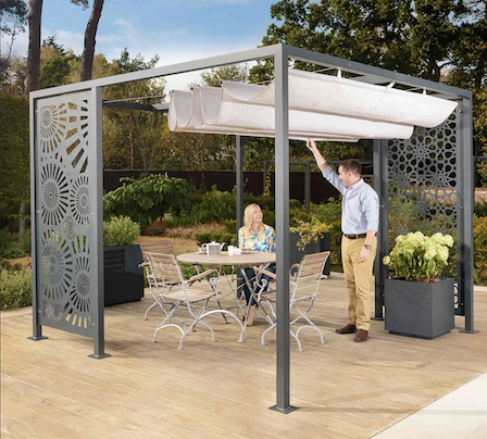 Modern metal pergola with a retractable canopy and scroll panels.