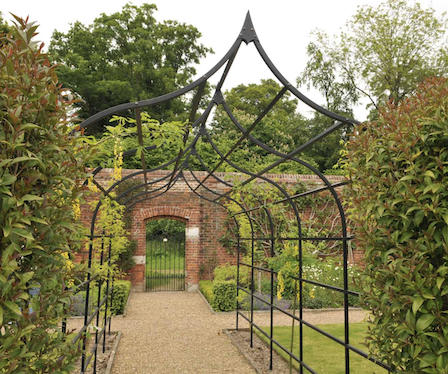 Metal rose arch walkway