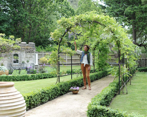 Attached metal rose arch walkway