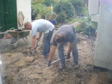Copyright image:  Digging out ready to lay the patio. 
