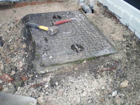 Copyright image:  Replacing drain covers. 