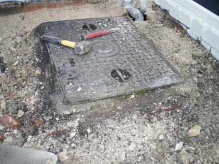 Copyright image:  Replacing drain covers. 