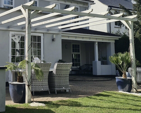 Attached lean-to pergola.