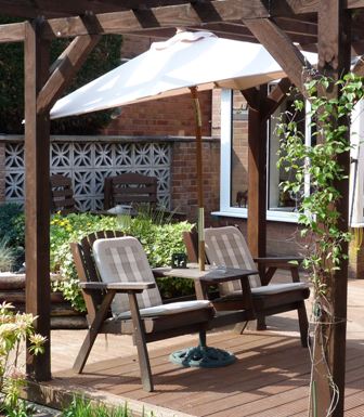 Copyright image: A fantastic attached lean-to pergola with garden seat.