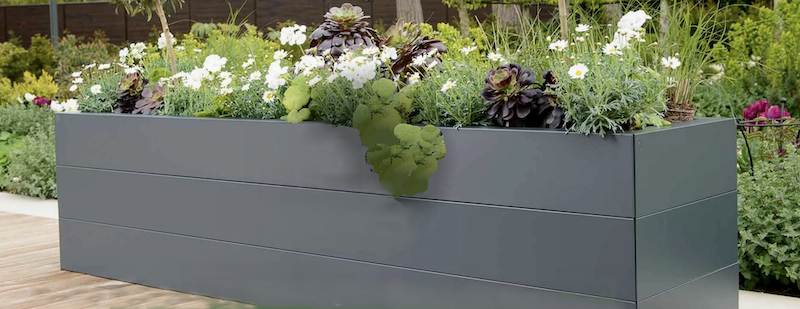 Sleek, modern metal raised bed in anthracite grey.