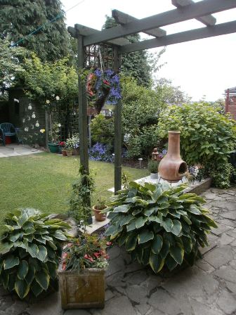 Copyright image: Pergola acting as a climbing rose support .