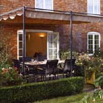 Pergola with retractable canopy.