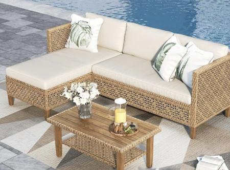 Rattan set with diamond pattern lounger and table.