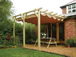Attached patio pergola with retractable canopy.