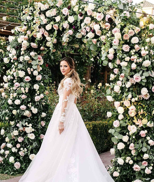 Metal rose arch used for a romantic wedding  bower.