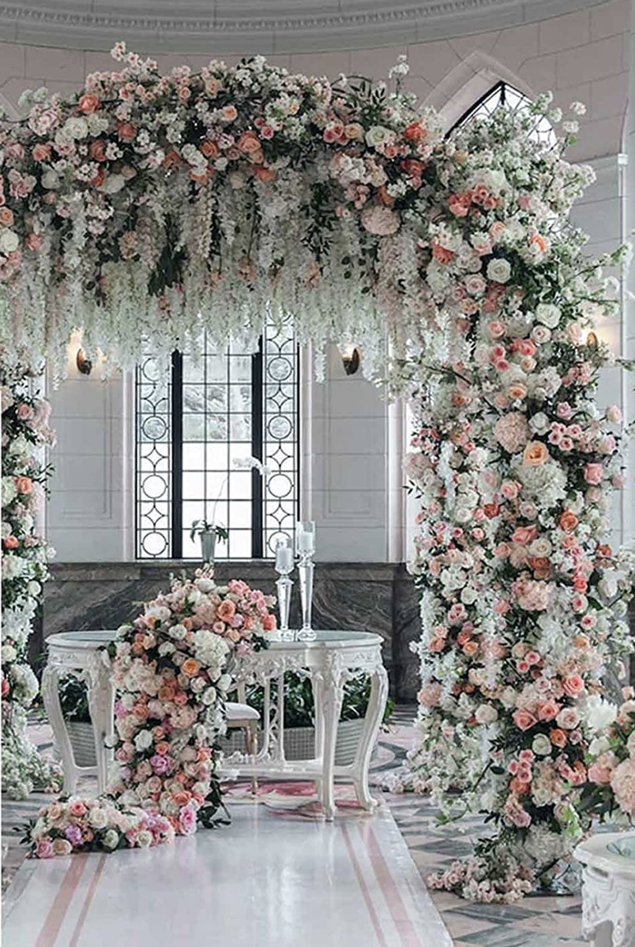 Metal rose arch used for a romantic wedding  bower.